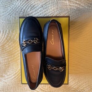 Black Loafers with Gold Detailing